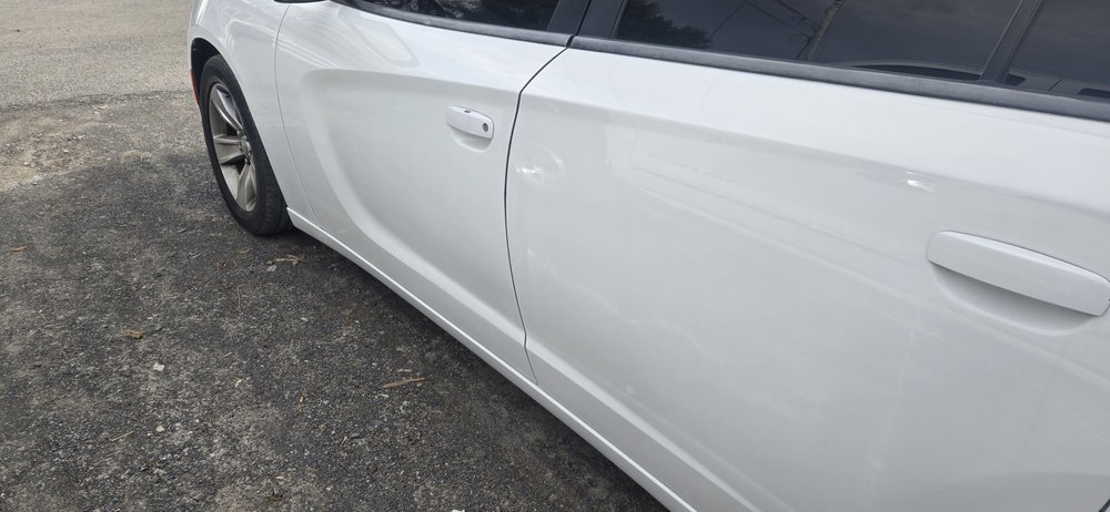 White Dodge Charger doors and quarter panel, repaired in Schenectady, NY